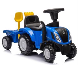 New Holland traktor med vogn, skovl og rive